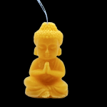 Buddha in cera candela